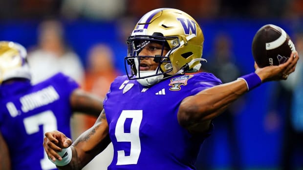 Michael Penix Jr. throws a pass in the Sugar Bowl